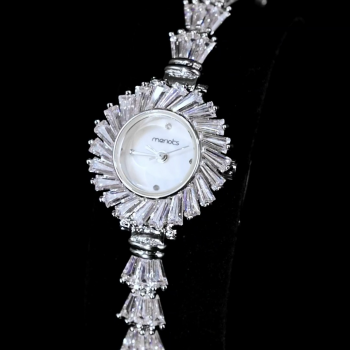 A luxurious watch with an elegant and distinctive design, plated with gold and adorned with zircon stones