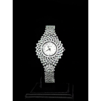 A luxurious watch with an elegant and distinctive design, plated with gold and adorned with zircon stones
