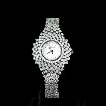 A luxurious watch with an elegant and distinctive design, plated with gold and adorned with zircon stones