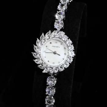A luxurious watch with an elegant and distinctive design, plated with gold and adorned with zircon stones
