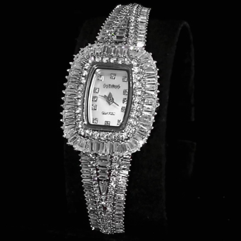 A luxurious watch with an elegant and distinctive design, plated with gold and adorned with zircon stones