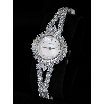 A luxurious watch with an elegant and distinctive design, plated with gold and adorned with zircon stones A luxurious watch with an elegant and distinctive design, plated with gold and adorned with zircon stones