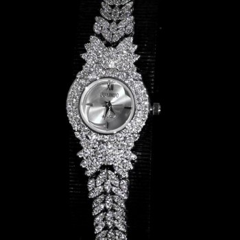 A luxurious watch with an elegant and distinctive design, plated with gold and adorned with zircon stones
