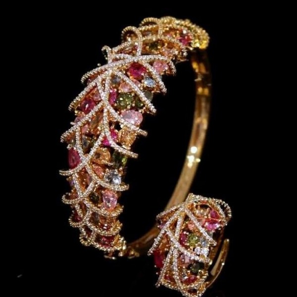 luxurious bangles adorned with diamond-like zircon stones, plated with gold